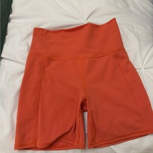 Vuori Women's Bright Orange Bike Shorts